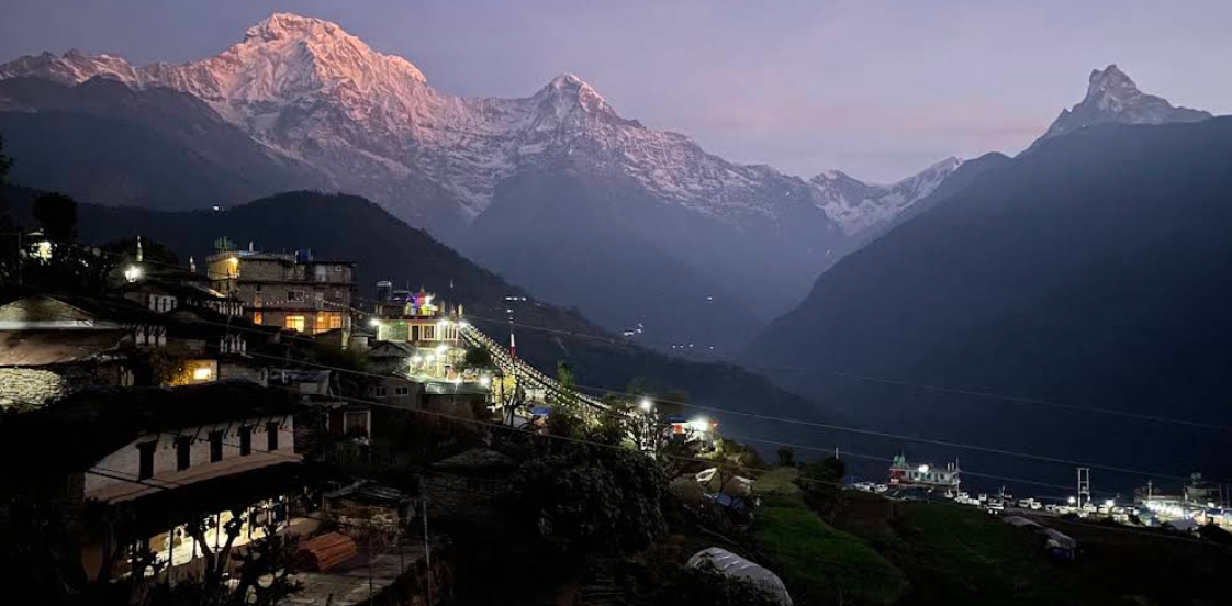 Evening light over Ghandruk village and the Annapurna range